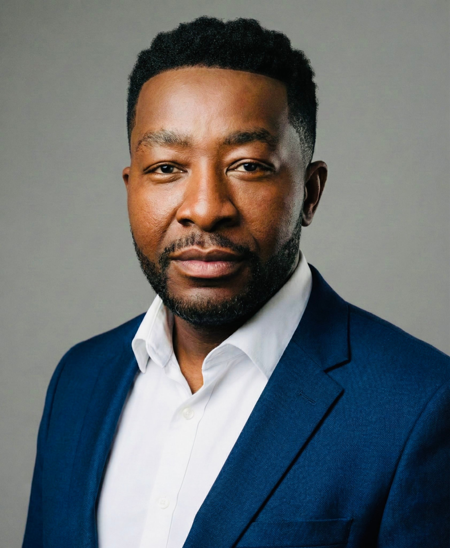Portrait of Dennis Angafor, Founder & Chief Digital Transformation Officer